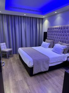 Кровать или кровати в номере Frangiorgio Hotel