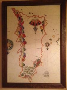 a framed picture of a map of india on a wall at The Knight and the Pomegranate - Luxury Medieval Villa in Rhodes Town