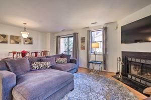 a living room with a couch and a fireplace at Washington DC Townhome 4 Mi to National Mall! in Washington, D.C.