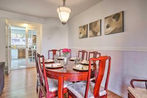 a dining room with a red table and chairs at Washington DC Townhome 4 Mi to National Mall! in Washington, D.C.