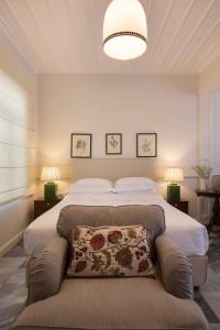 Cama ou camas em um quarto em Dorion Hotel