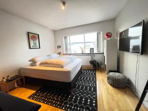 Postel nebo postele na pokoji v ubytování Luxary apartment centrally located in Reykjavik