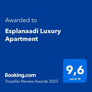 a blue sign with the text awarded to esplanadian luxury appointment at Esplanaadi Luxury Apartment in Pärnu
