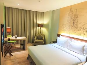 Postel nebo postele na pokoji v ubytování AONE Hotel + 37 fotografií