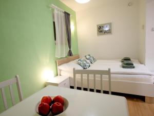 Postel nebo postele na pokoji v ubytování Apartmány Bramborka