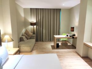 Χώρος καθιστικού στο AONE Hotel