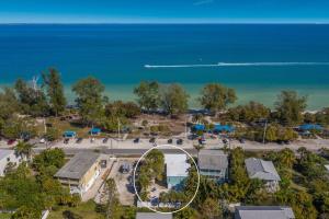 an aerial view of a park next to the ocean at Coquina Cottage B home in Anna Maria