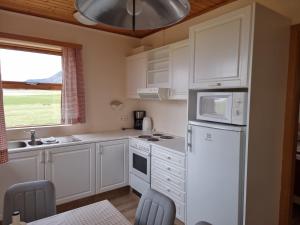 Kuchyň nebo kuchyňský kout v ubytování Litla-Hof Guesthouse