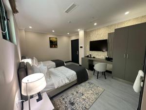 Voodi või voodid majutusasutuse Hills Resort Hotel toas