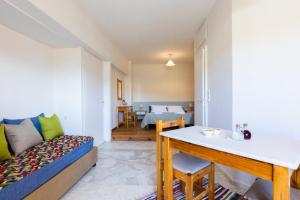 Postel nebo postele na pokoji v ubytování Chrysa House Apartments