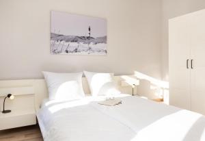 Letto o letti in una camera di Ille
