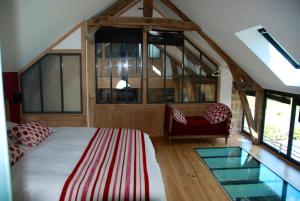 Posteľ alebo postele v izbe v ubytovaní Villa spacieuse à Noailhac avec piscine privée