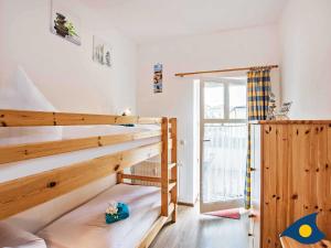 Ein Bett oder Betten in einem Zimmer der Unterkunft Villa Malve Wohnung 05