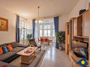 Ein Sitzbereich in der Unterkunft Villa Malve Wohnung 05