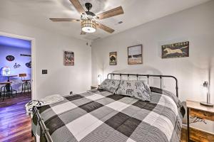 a bedroom with a bed and a ceiling fan at North Fork Vacation Rental 28 Mi to Yosemite in North Fork