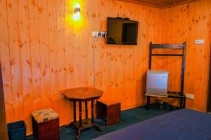 TV a/nebo společenská místnost v ubytování Blue Moon Residency + 33 fotografií