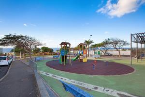 a park with a playground with a slide at Apto Aguacada in Punta del Hidalgo