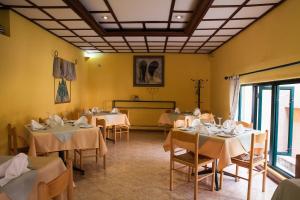 Restavracija oz. druge možnosti za prehrano v nastanitvi Gorillas City Centre Hotel