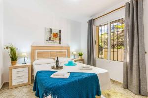 Postel nebo postele na pokoji v ubytování Villa Enzo Moraira + 37 fotografií