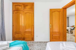 Postel nebo postele na pokoji v ubytování Villa Enzo Moraira