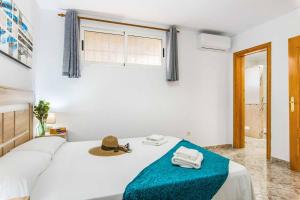 Postel nebo postele na pokoji v ubytování Villa Enzo Moraira