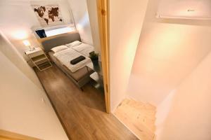 Posteľ alebo postele v izbe v ubytovaní Cute Gallery Flat in Király Street