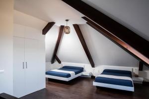Posteľ alebo postele v izbe v ubytovaní Apartamentos Redondela - A Casa da Praia + 37 fotografií