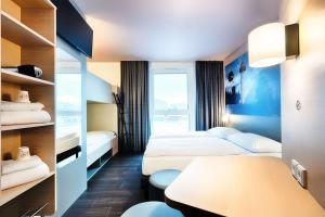 Postel nebo postele na pokoji v ubytování B&B Hotel Willingen