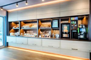 a bar in a restaurant with a counter at B&B Hotel Willingen in Willingen