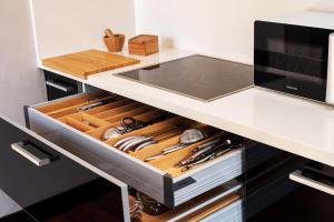 a kitchen with a counter with a drawer at Apartamentos Redondela - A Casa da Praia in Redondela
