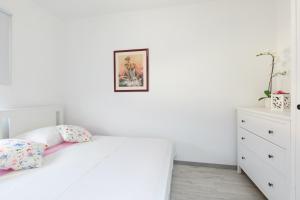 Posteľ alebo postele v izbe v ubytovaní Brand new apartments Viktorija just 250m from the beach!