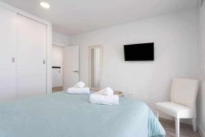 Postel nebo postele na pokoji v ubytování Sunny Island Paraiso Beach