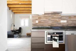 A kitchen or kitchenette at Sunnyland atico las teresitas 4