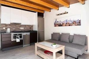 A kitchen or kitchenette at Sunnyland atico las teresitas 4