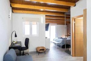 A bed or beds in a room at Sunnyland atico las teresitas 4