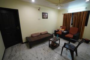 Posezení v ubytování Kumbakonam homestay