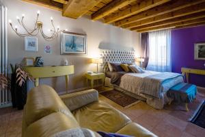 A bed or beds in a room at Mazzini Suite