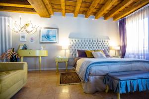 A bed or beds in a room at Mazzini Suite