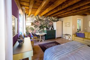 A bed or beds in a room at Mazzini Suite