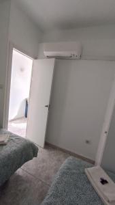 Posteľ alebo postele v izbe v ubytovaní Apartamento Blancomar