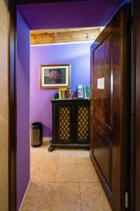 A television and/or entertainment centre at Mazzini Suite