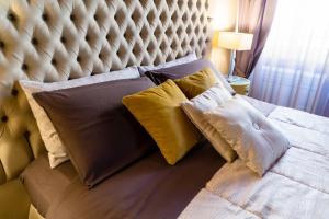A bed or beds in a room at Mazzini Suite