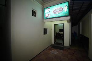TV a/nebo společenská místnost v ubytování Kumbakonam homestay