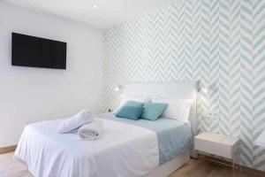 Posteľ alebo postele v izbe v ubytovaní Sunny Island Paraiso Sur