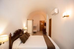 Posteľ alebo postele v izbe v ubytovaní Hotel Casa Palacio la Sal