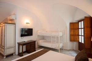 Posteľ alebo postele v izbe v ubytovaní Hotel Casa Palacio la Sal