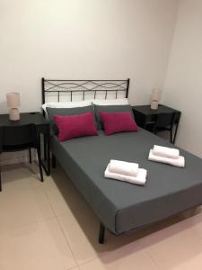Posteľ alebo postele v izbe v ubytovaní La Victoria Home