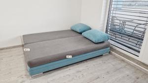 Posteľ alebo postele v izbe v ubytovaní Apartmány Vinohrady