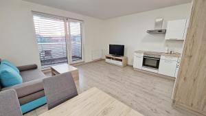Kuchyňa alebo kuchynka v ubytovaní Apartmány Vinohrady