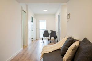 A seating area at For You Rentals Cozy Apartment TEMPORAL La Vaguada Madrid PMO10